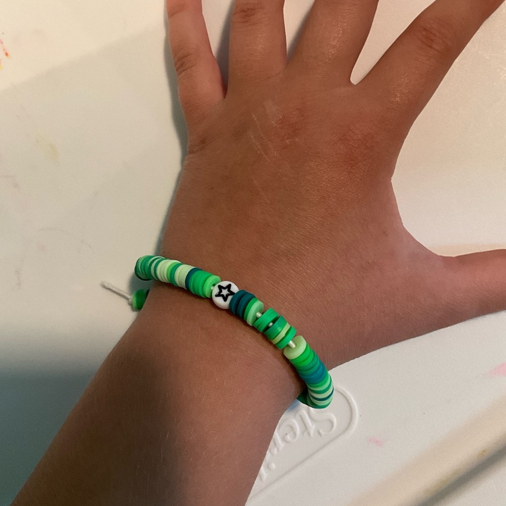 All shades of green bracelet with star bead